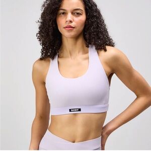 Bandit Running Cadence Scoop Neck sports bra with phone pocket in light thistle